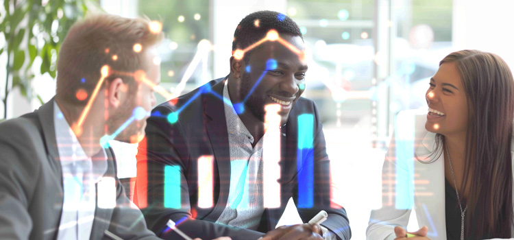 a group of 3 people having a meeting in an office